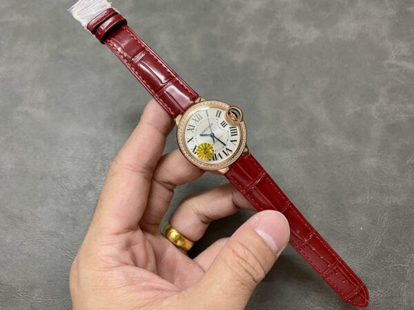 WJBB0033 Cartier 33mm Ballon Bleu Automatic Watch with Roman Numeral Dial and Smooth Bezel
