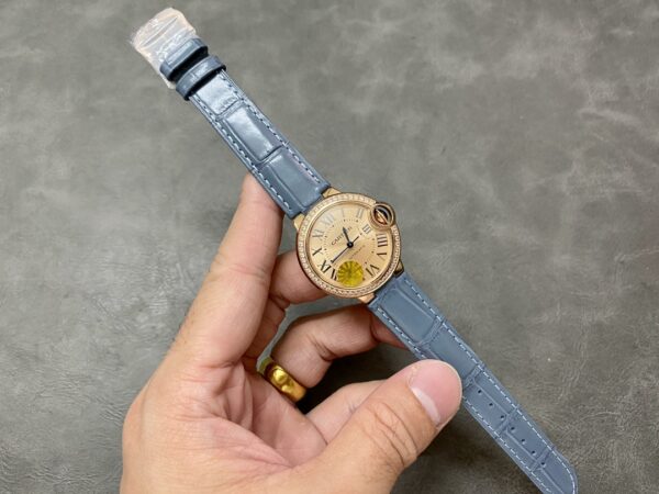 WJBB0076 Cartier 33mm Ballon Bleu Automatic Watch with Roman Numeral Dial and Smooth Bezel